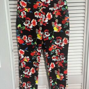 Attyre Black Capris with Vibrant Red Floral Design
